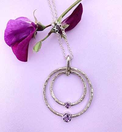 Hammered silver and amethyst pendant